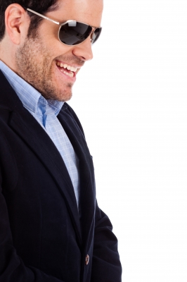Man laughing seriously